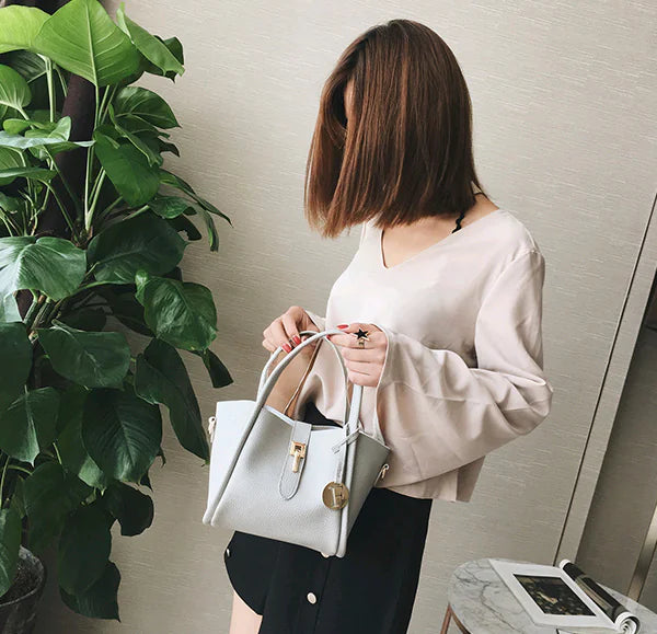 Stylish New Women’s Handbag with Simple Lock Closure